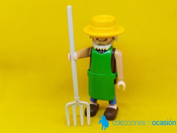 Playmobil Granjero con delantal verde y horca