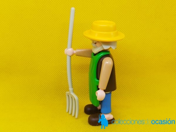 Playmobil Granjero con delantal verde y horca - Imagen 2