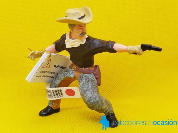 Papo vaquero con pistola
