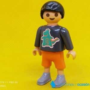 Playmobil Niño con dinosaurio en la camiseta