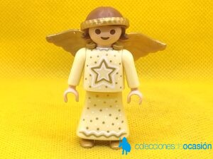 Playmobil Ángel con alas doradas y estrella en el pecho