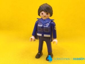 Playmobil Mujer policía con uniforme azul y pistola